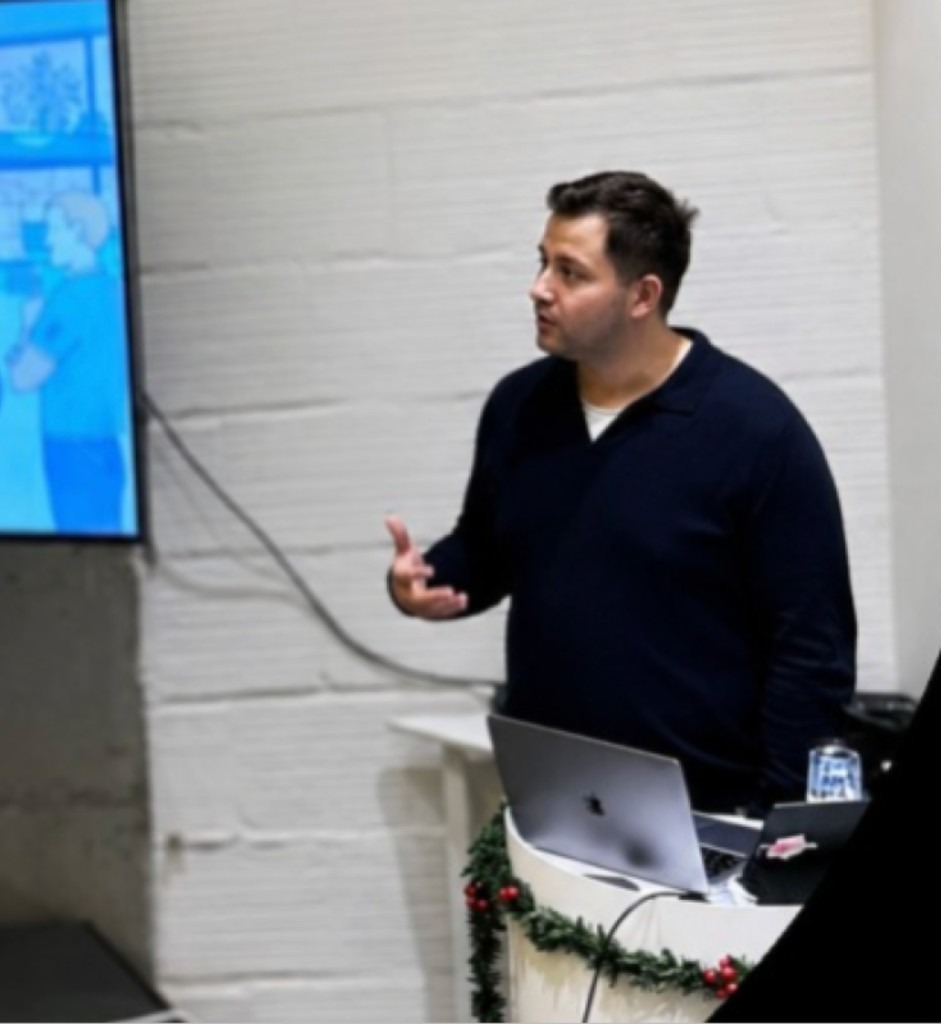 Stefan speaking at an event